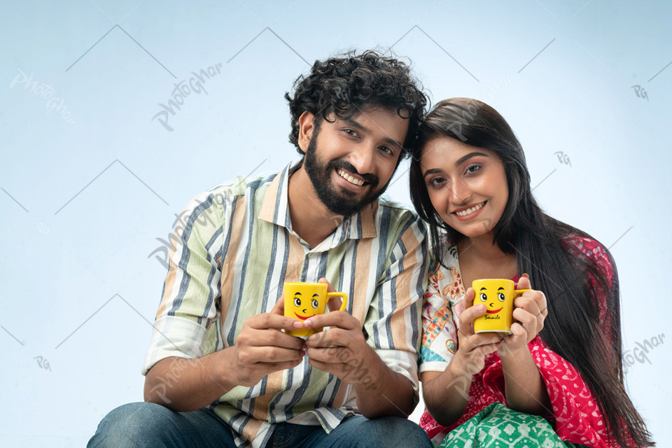 Happy husband wife couple drinking coffee