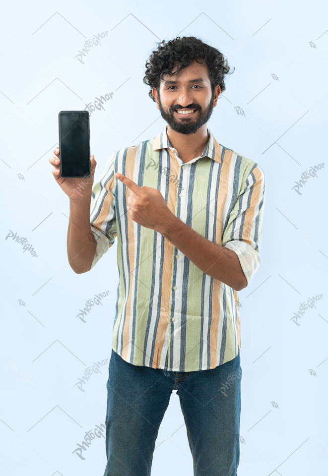 Happy man pointing to the mobile