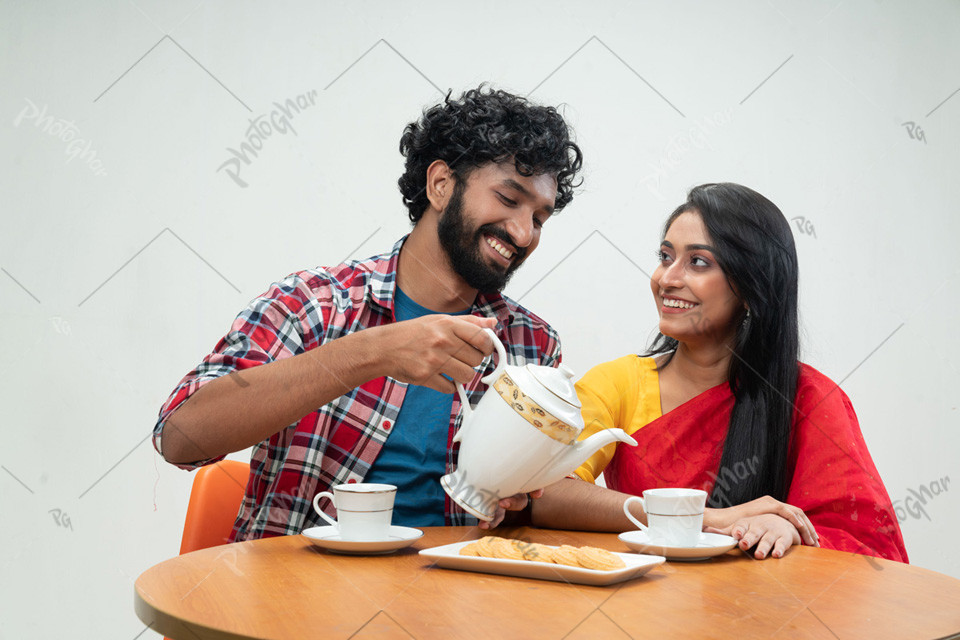 Happy new couple having breakfast