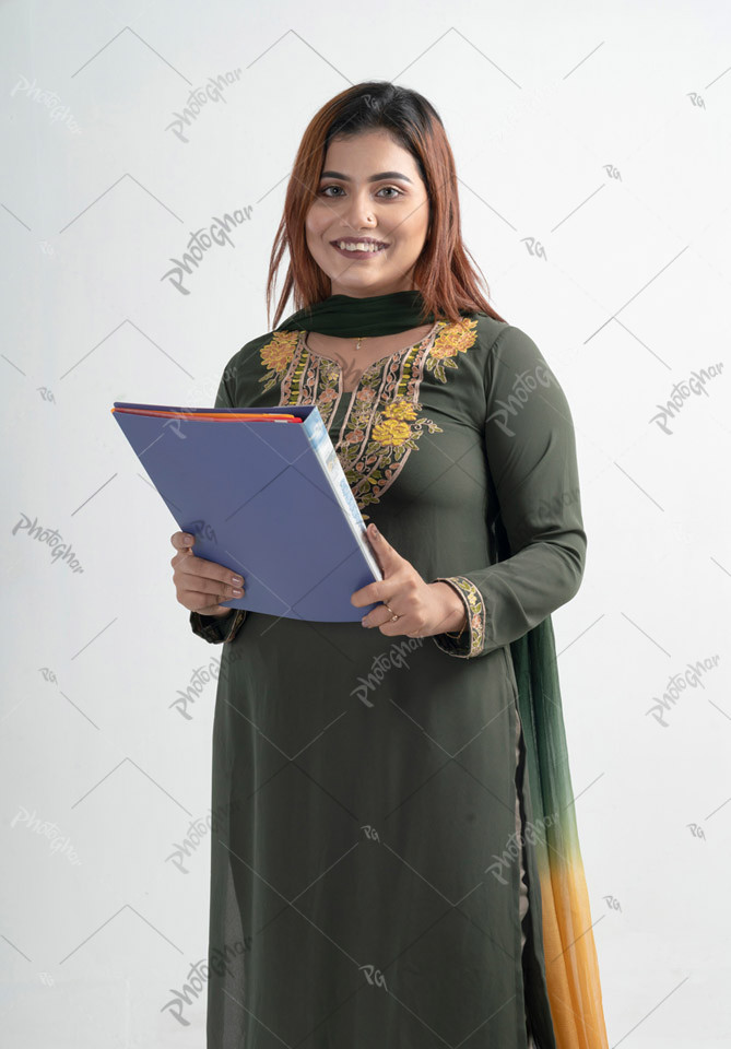 Happy smiling young adult woman holding files