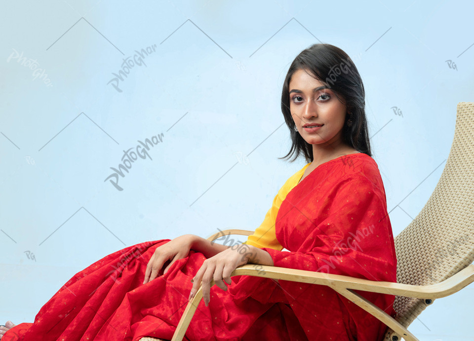 Happy woman sitting on rocking chair