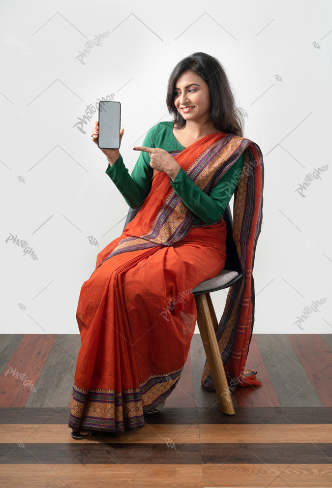 Happy young adult girl showing mobile apps