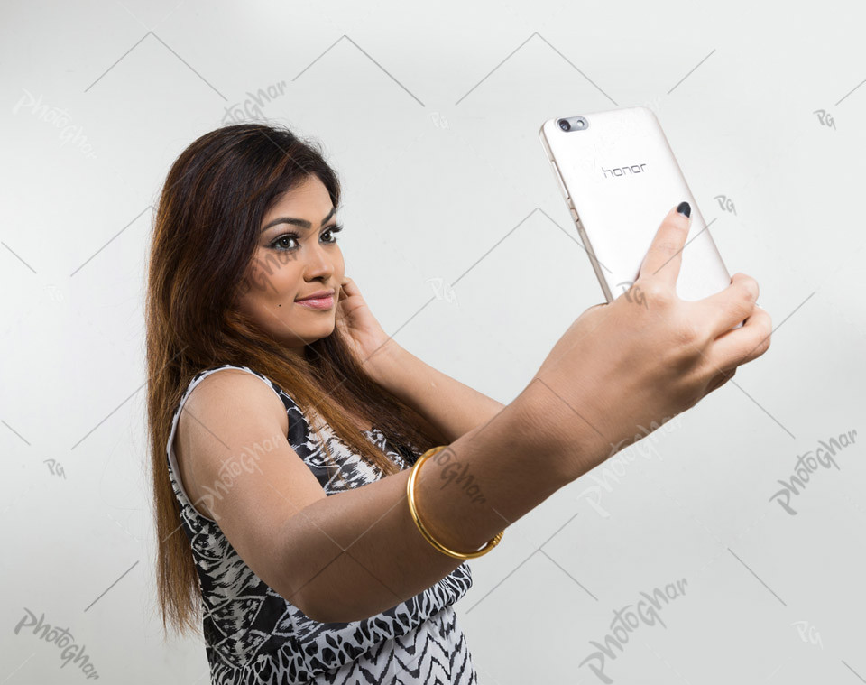 Holding Phone For Selfie