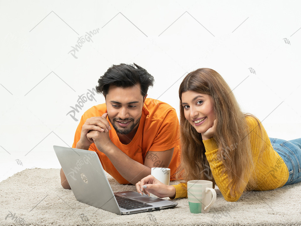 Joyful couple browsing internet