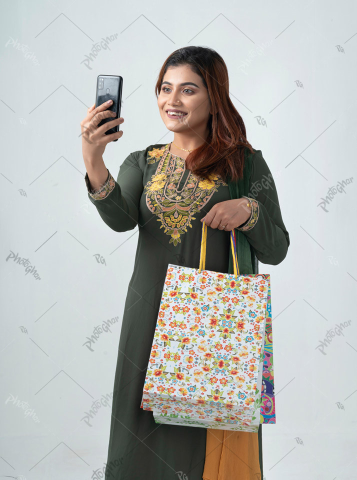 Joyful gentlewoman taking selfie