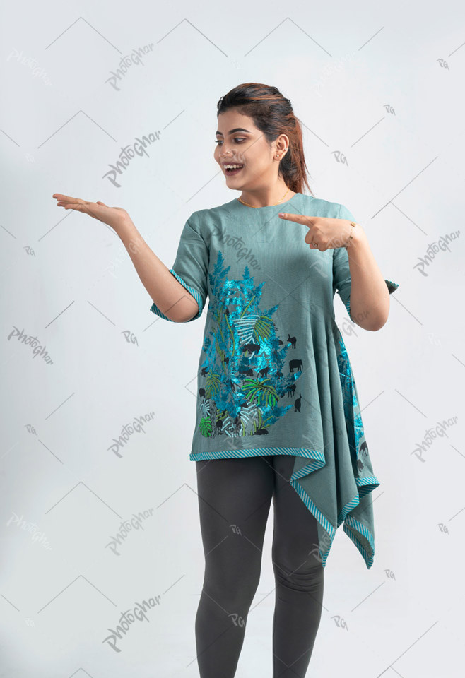 Joyful woman pointing to the hand's palm