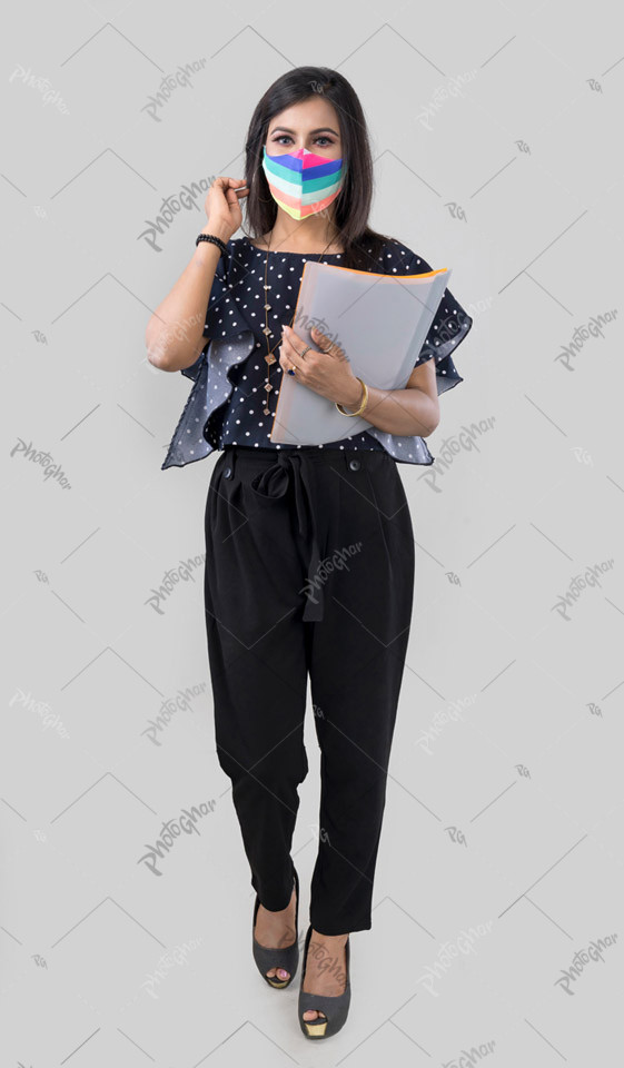 Mask-wearing woman officer walking