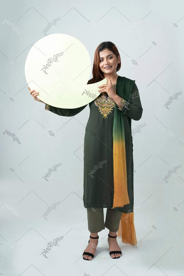 Mature adult gentlewoman holding blank cutout symbol