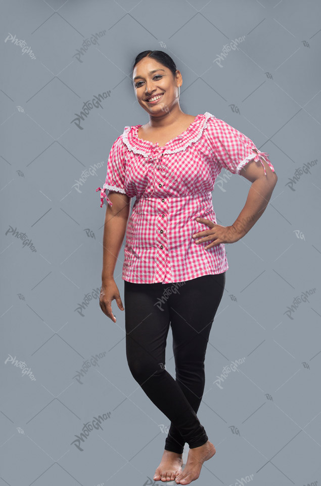 Mature adult woman posing with hand on her waist