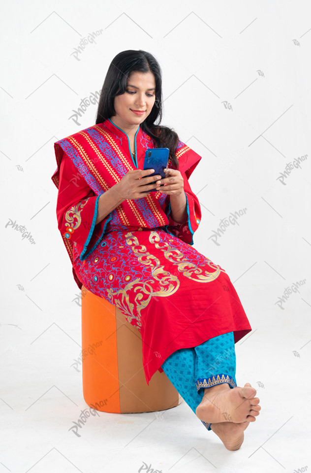 Middle class housewife using mobile cell phone