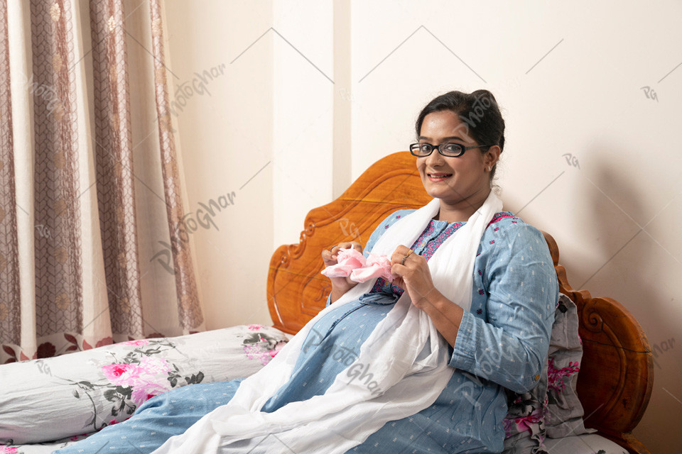 Newborn baby mother holding baby dress