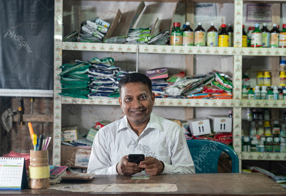 Portrait of male shopkeeper at Growel seeds