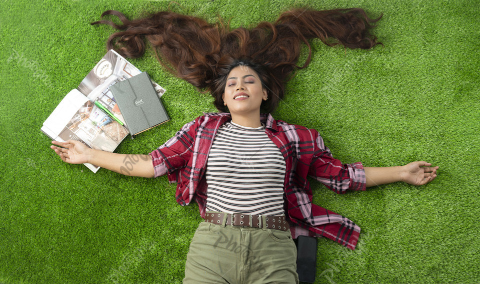 Relaxed female long hair on grass field