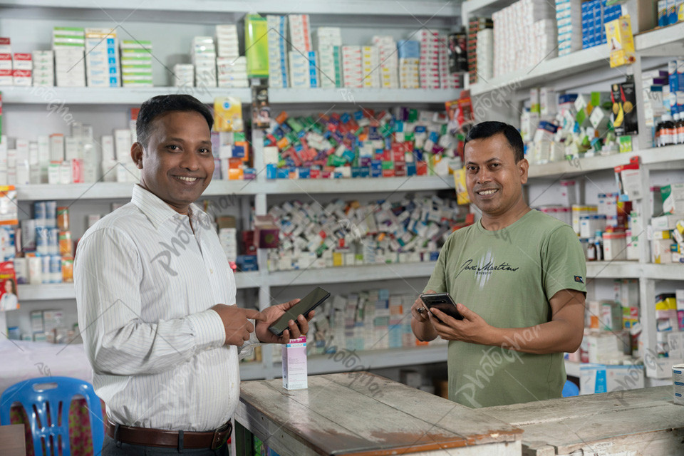 Salesman and customer checking online payment