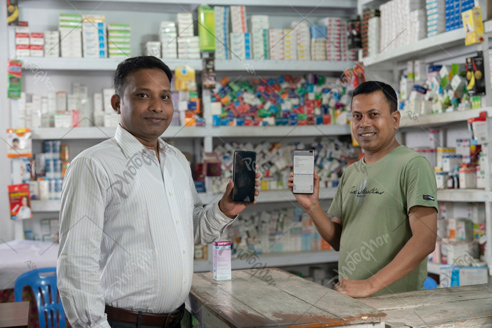 Salesman and customer displaying online