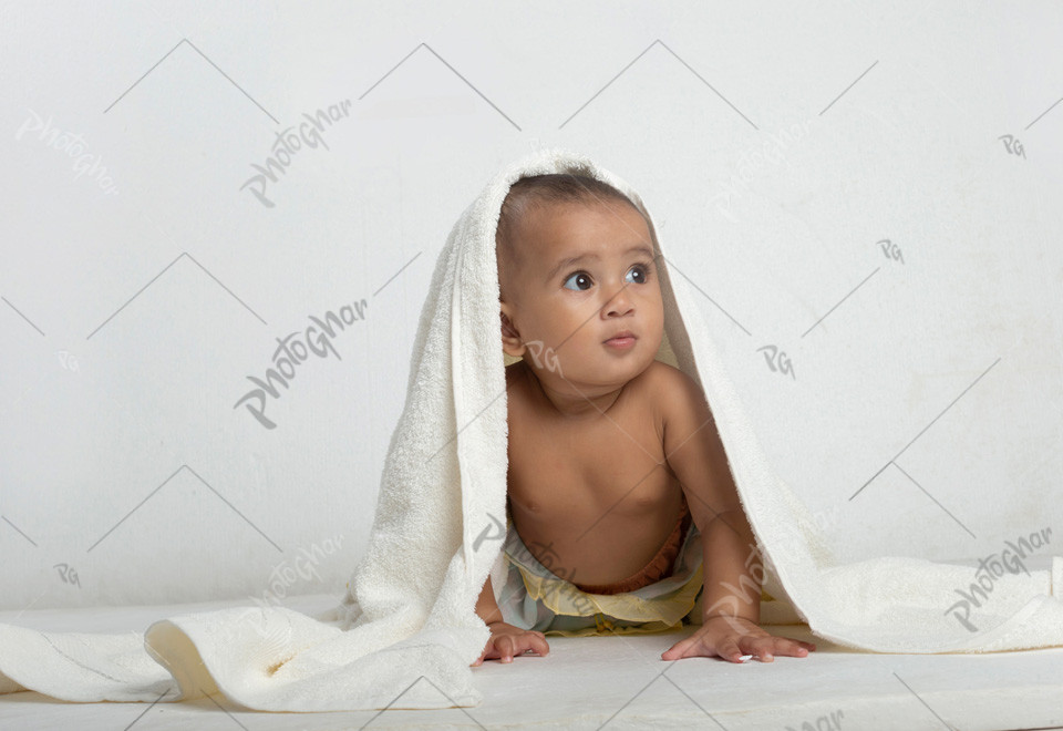 Small baby crawl on bed