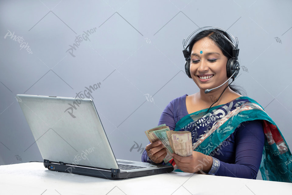 Smiling Woman Providing Financial Services Online