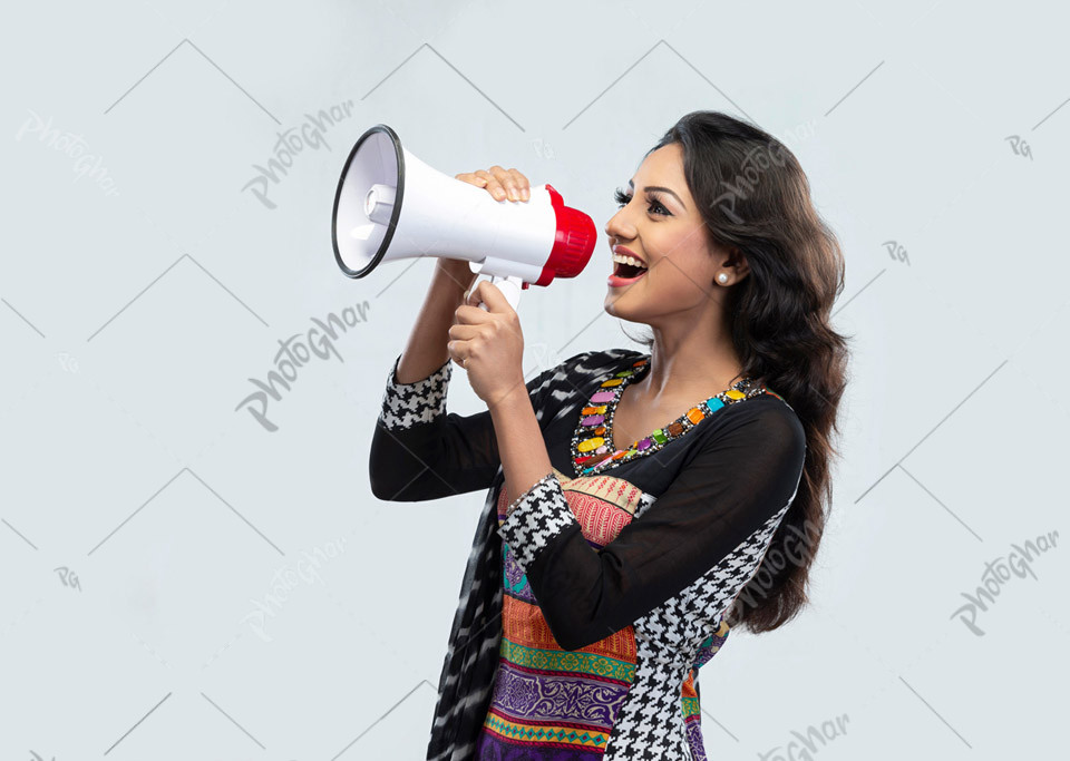 Smiling toothy woman holding megaphone