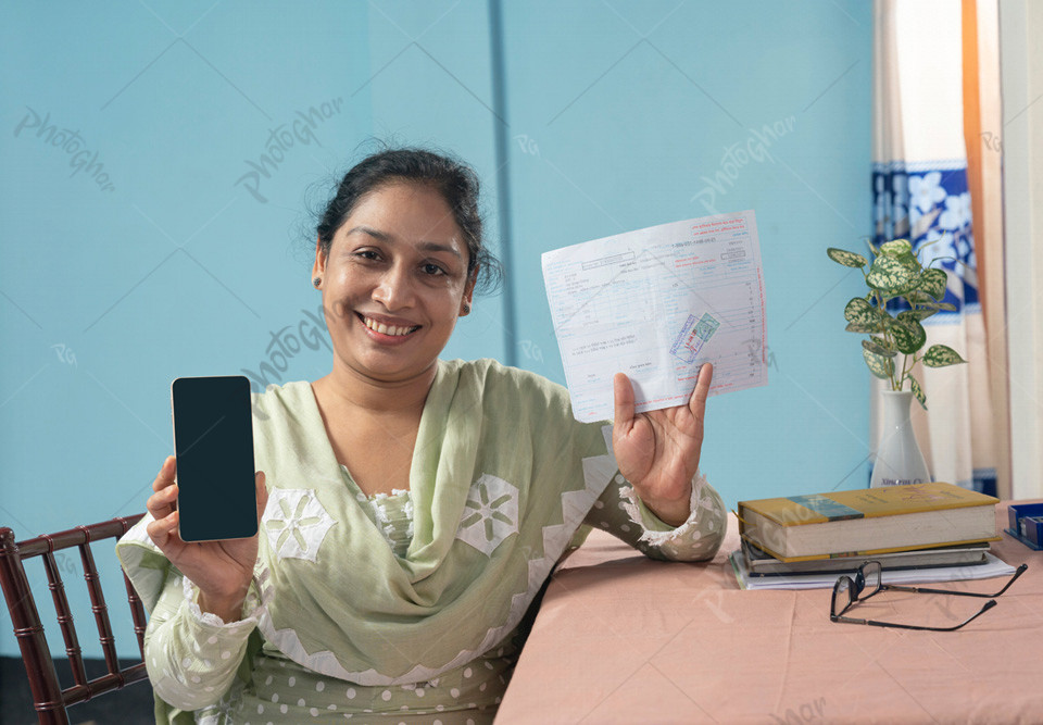 Smiling woman paying online