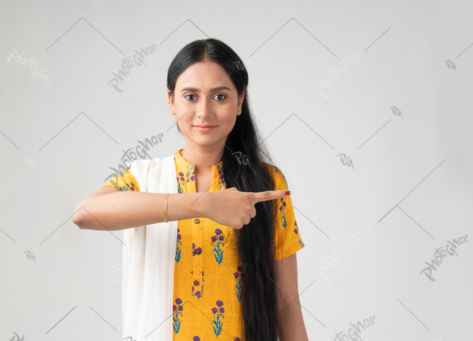 Smiling woman pointing right side