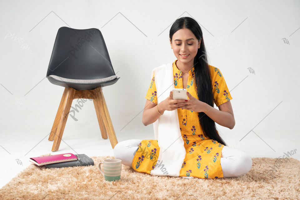 Student studying online using mobile phone