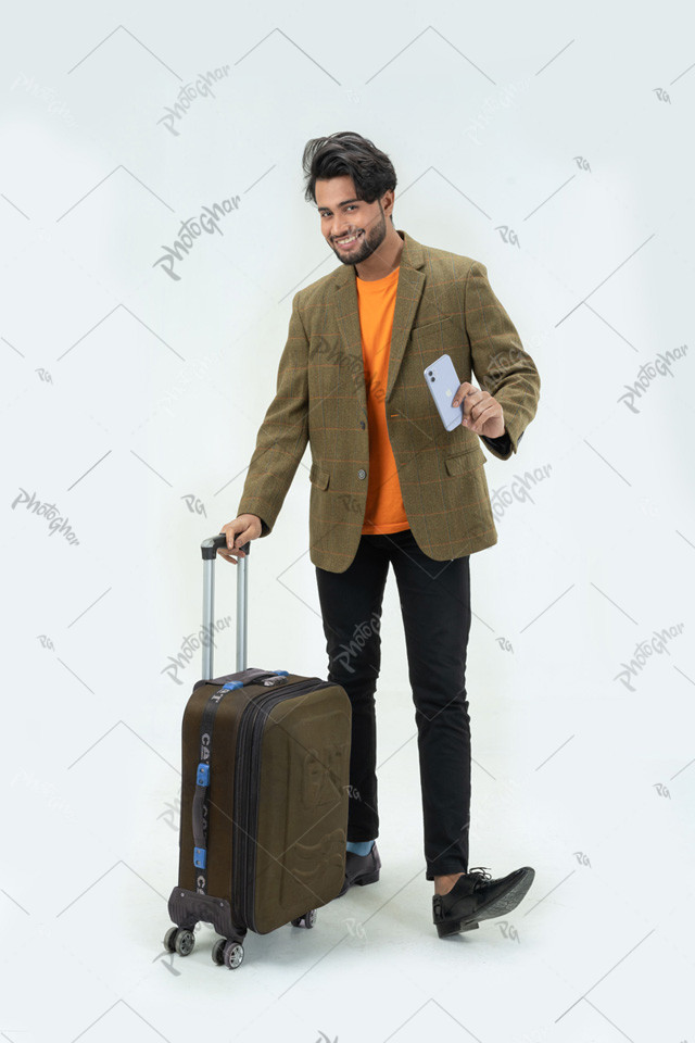 Traveler young man holding suitcase