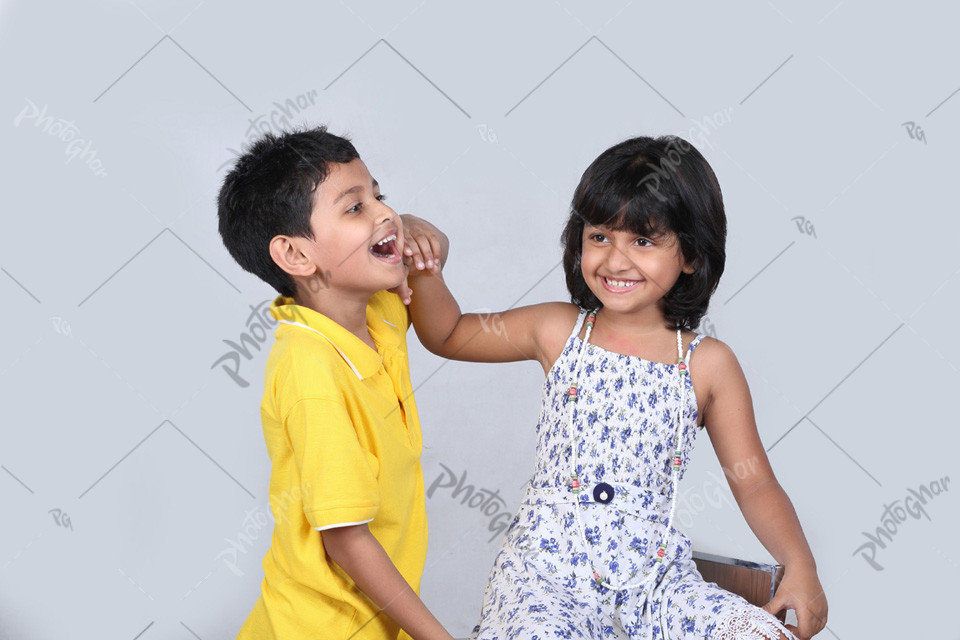 Two cute children making fun