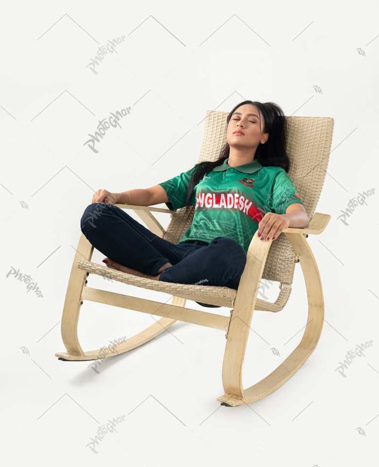 Woman cricket supporter relaxing with eye closed