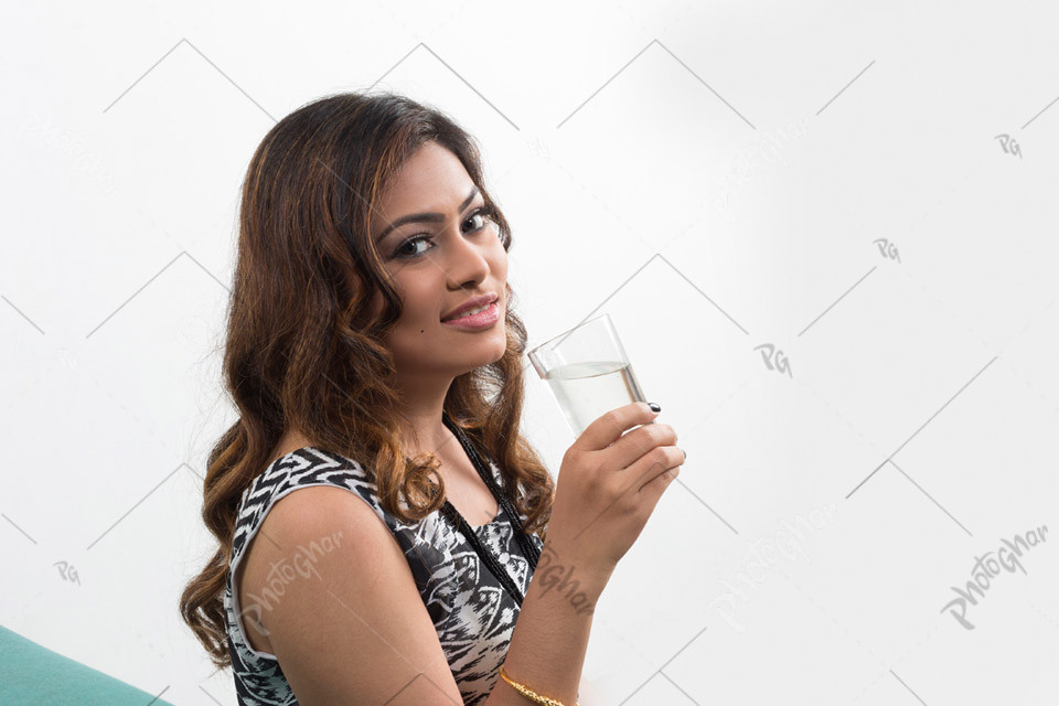 Woman drinking glass of water