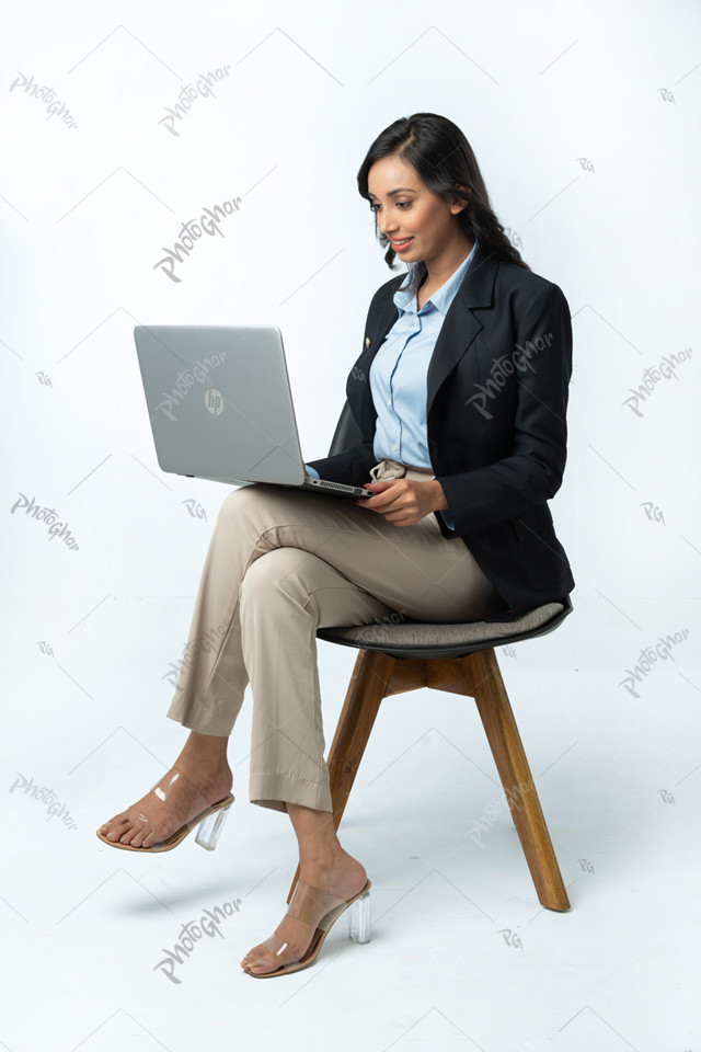 Woman entrepreneur using laptop