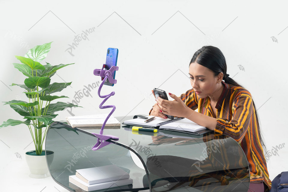 Young Bangladeshi girl attending online school