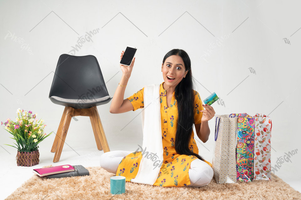 Young Woman Excited About Online Discounts