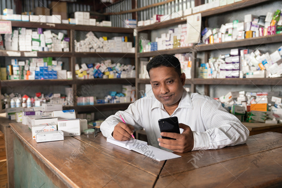 Young adult man of Bangladeshi village pharmacy