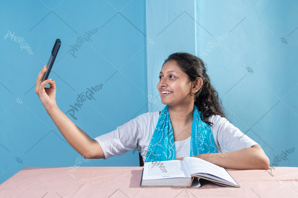 Young cute nice girl talking video call
