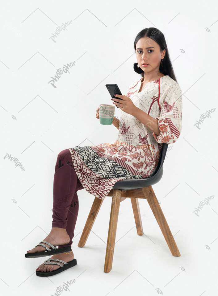 Young girl drinking coffee