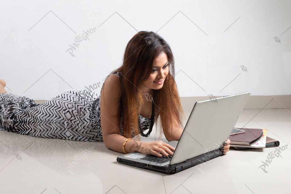 Young girl using laptop computer