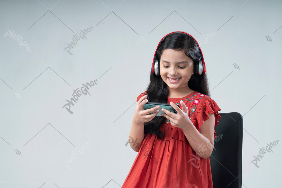 Young happy child playing games