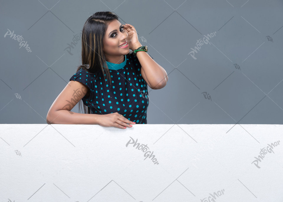 Young woman gesturing empty placard