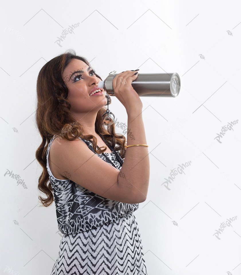 Young woman having water