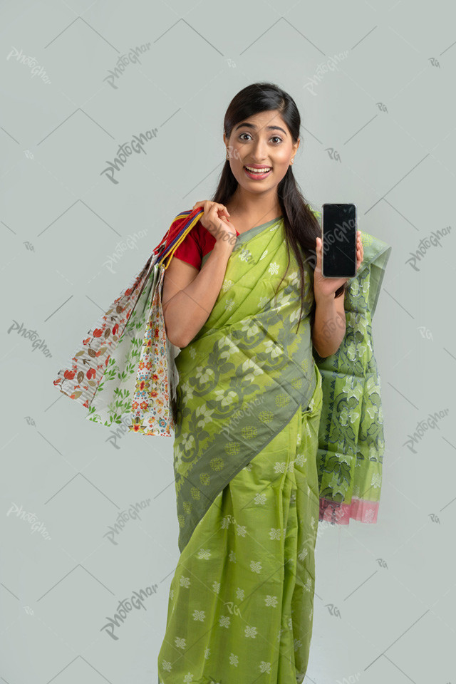 Young woman showing mobile empty screen