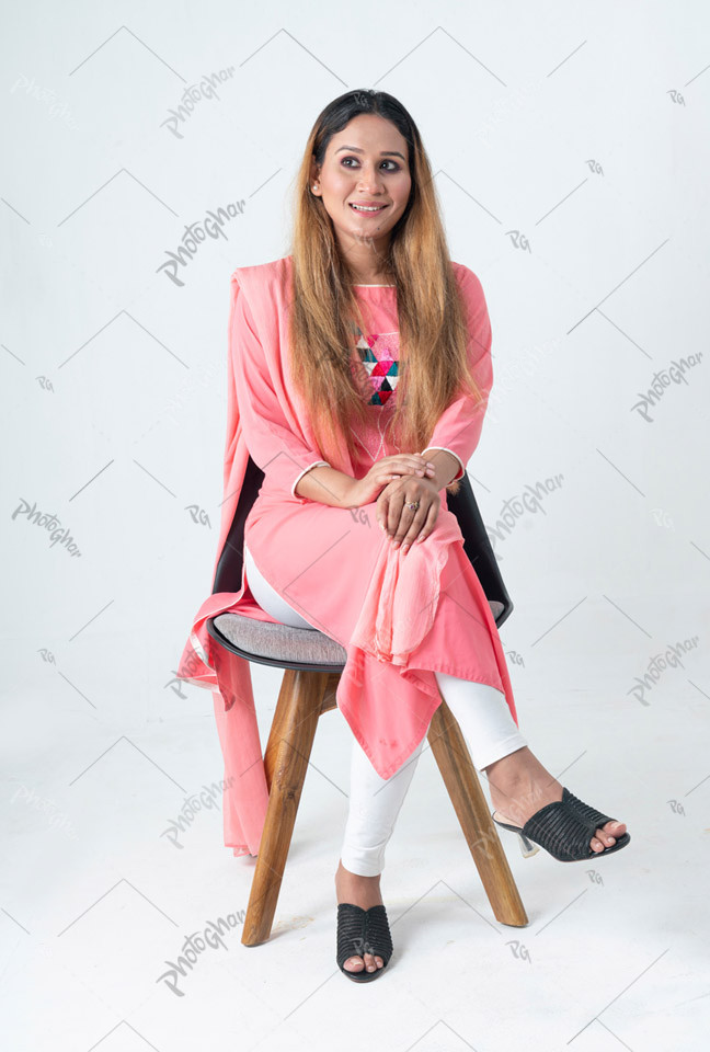 Young woman sitting on chair