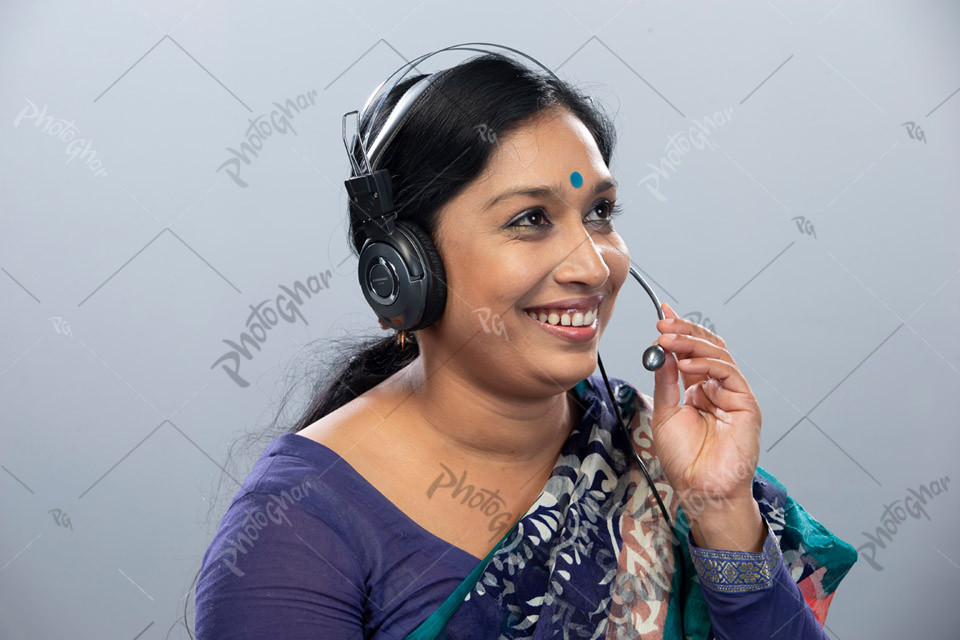 Young woman talking smiley in call center