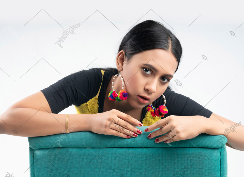 Young woman wearing beautiful earrings