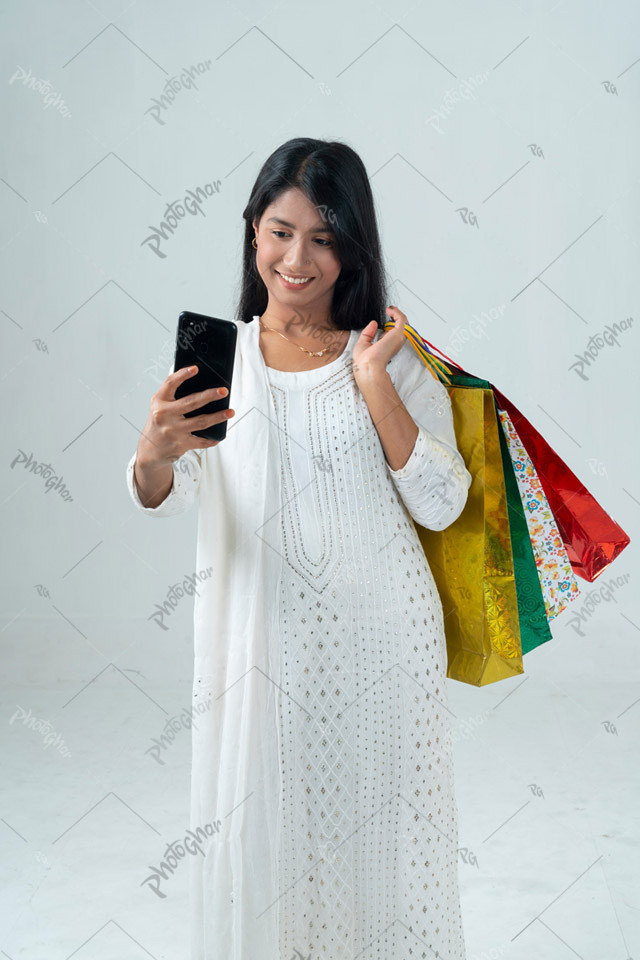 beautiful female customer using smartphone