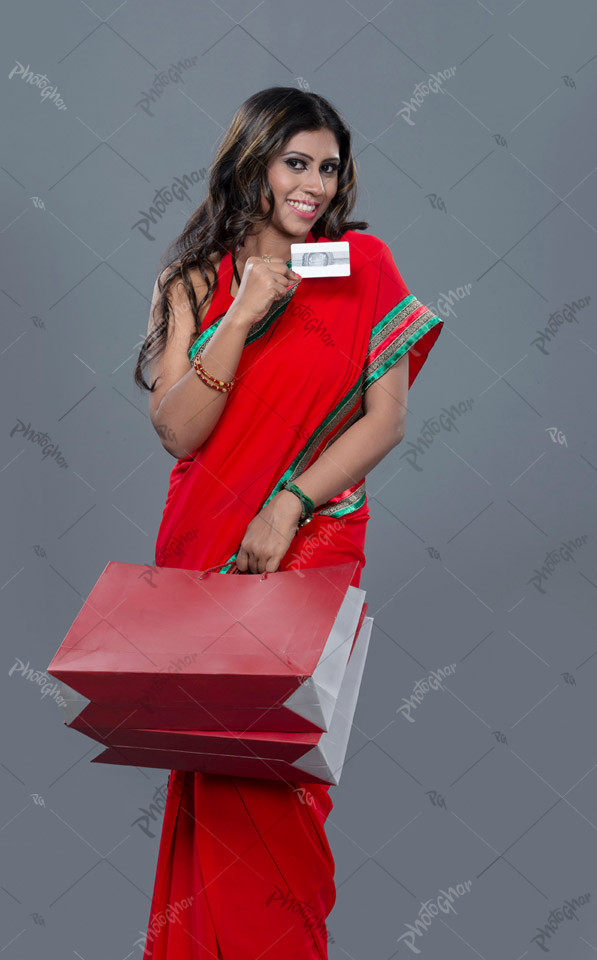 beautiful woman holding creadit card