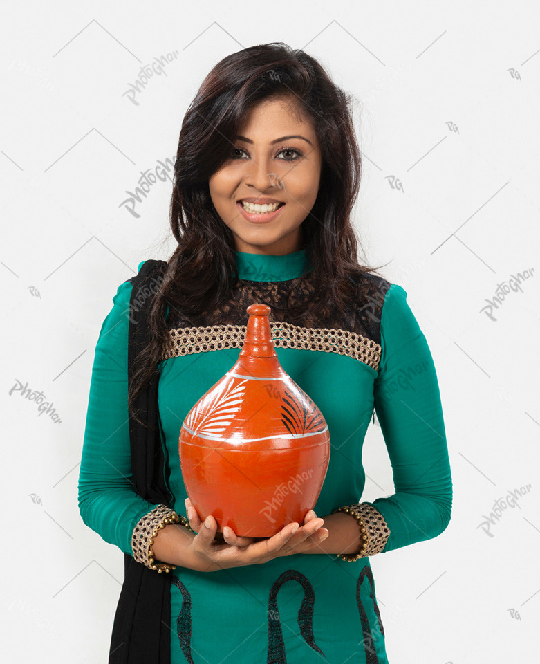 beautiful young girl showing clay bank