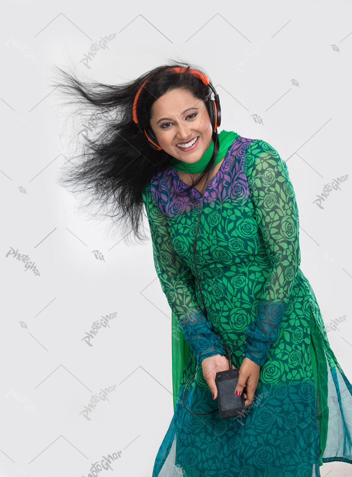 beautiful young lady listening to music