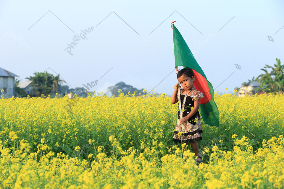 child holding national flag