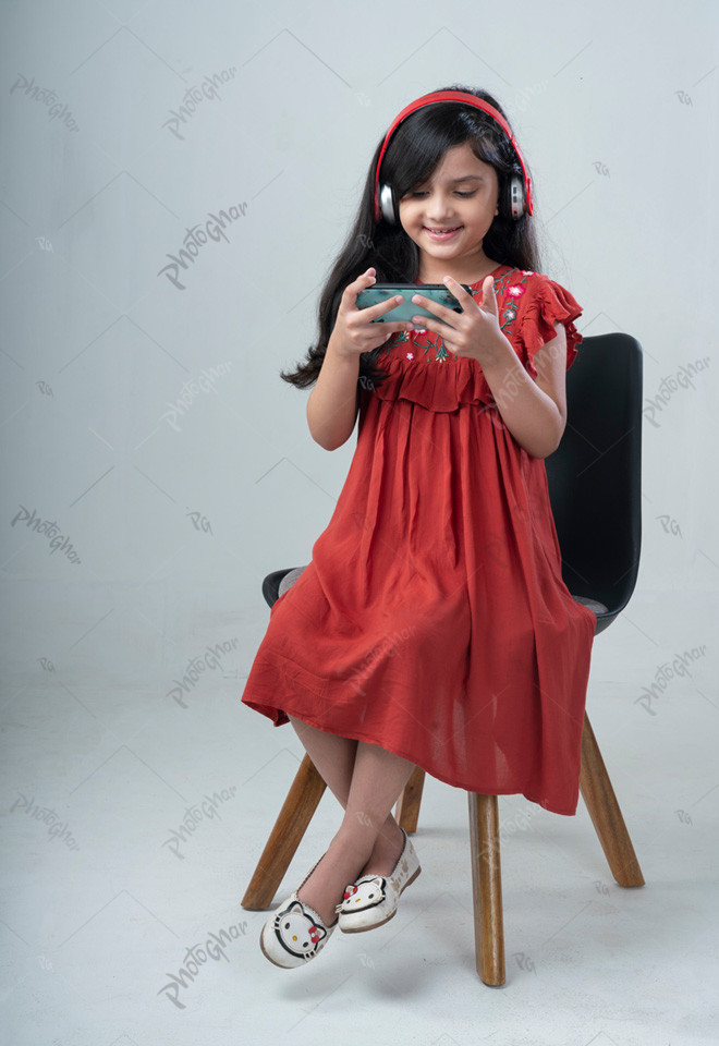 child playing Mobile Games