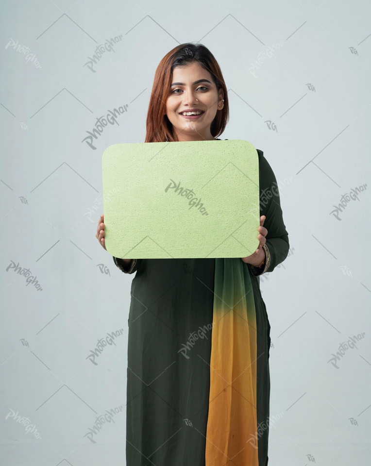 confident modern woman holding placard